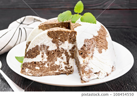 Dessert of curd and chocolate on dark board Dessert of curd and chocolate on dark board 108454550