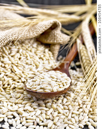 Spelled in spoon on wooden board 108454785