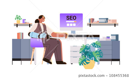 disabled business woman seo specialist with replaced robotic arm working on project people with disabilities concept disabled business woman seo specialist with replaced robotic arm working on project people with disabilities concept 108455368