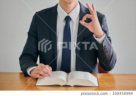 Male lawyer receiving legal advice and giving advice 108458994