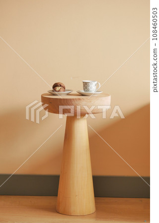 chocolate sweet cookies and black coffee on a serving table  108460503