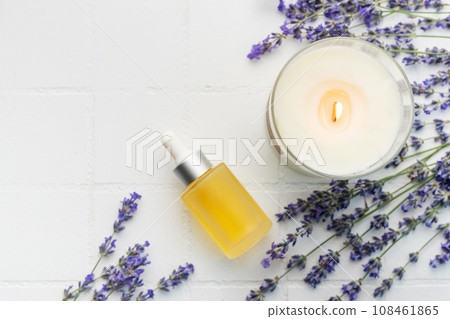 Lavender spa. Lavender natural essential oil, aromatic candle and fresh lavender Lavender spa. Lavender natural essential oil, aromatic candle and fresh lavender 108461865