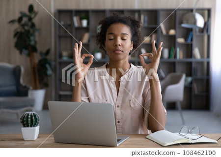 Peaceful African remote employee, student girl, business woman Peaceful African remote employee, student girl, business woman 108462100