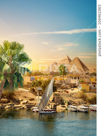 Nile and pyramids 108462865
