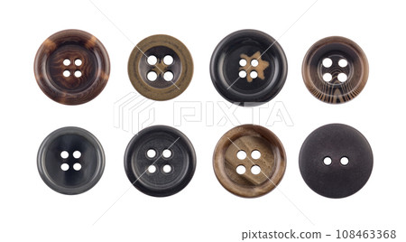 Group of various sewing clothing buttons isolated on white background Group of various sewing clothing buttons isolated on white background 108463368