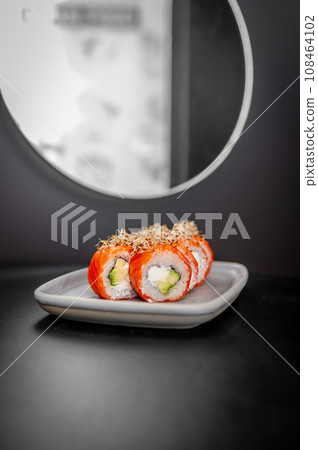 Classic Philadelphia sushi roll set with salmon and cream cheese. 108464102