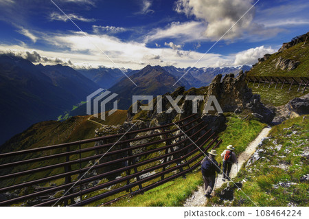 Old couple hiking on hiking trails 108464224
