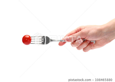female hand holds a dining fork with fresh cherry tomatoes isolated on the white background female hand holds a dining fork with fresh cherry tomatoes isolated on the white background 108465880