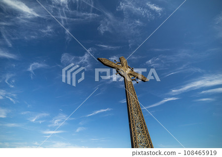 church cross on sky background with clouds 108465919