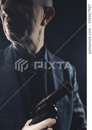 Assasin spy killer with handgun pistol Assasin spy killer with handgun pistol 108467997