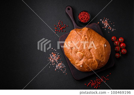 Delicious fresh crispy brown bread with seeds and grains Delicious fresh crispy brown bread with seeds and grains 108469196