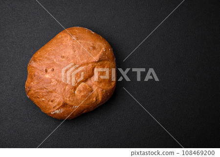 Delicious fresh crispy brown bread with seeds and grains 108469200