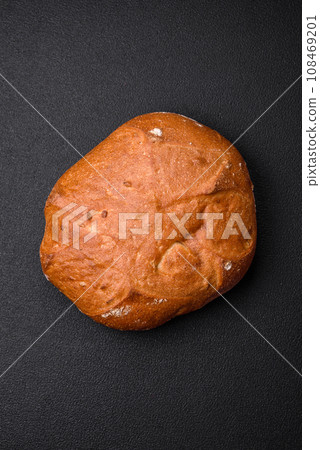 Delicious fresh crispy brown bread with seeds and grains 108469201