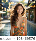 Beautiful woman by the pool 108469576