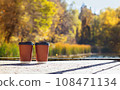 Couple Cups of coffee outdoors in autumn. 108471134
