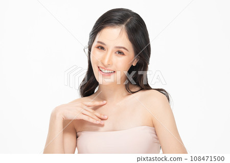 Beautiful Asian young woman touching soft cheek smile with clean fresh skin Happiness and cheerful with positive emotional,isolated on white background,Beauty Cosmetics and Facial treatment Concept 108471500