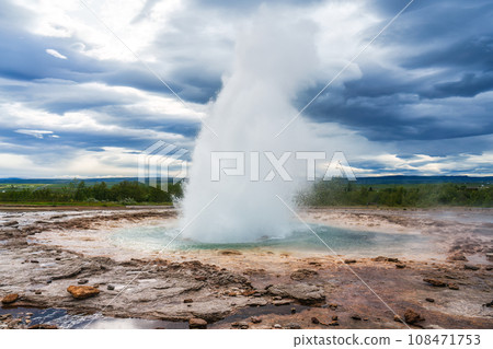 Strokkur Geyser eruption, natural hot spring pulsing in national park Strokkur Geyser eruption, natural hot spring pulsing in national park 108471753