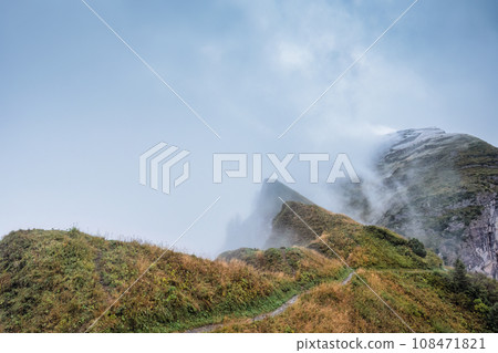 Foggy mountain ridge of Saxer Lucke viewpoint in the morning at Appenzell, Switzerland 108471821