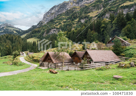 Rustic village in Alpstein mountain range between trail to Seealpsee lake during summer at Appenzell, Switzerland 108471830
