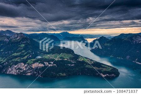 Fronalpstock on summit and moody sky overlooking Lake Lucerne at Schwyz, Switzerland Fronalpstock on summit and moody sky overlooking Lake Lucerne at Schwyz, Switzerland 108471837