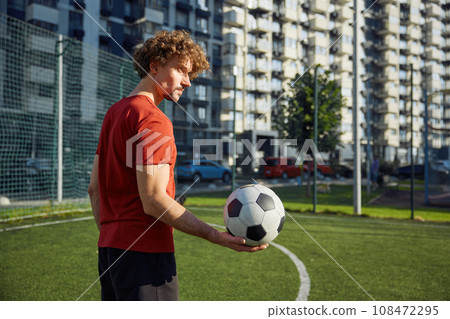 Portrait of happy male football trainer or soccer player Portrait of happy male football trainer or soccer player 108472295