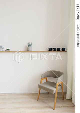 Stylish chair a chair in the dining room or living room in Scandinavian style Stylish chair a chair in the dining room or living room in Scandinavian style 108472514