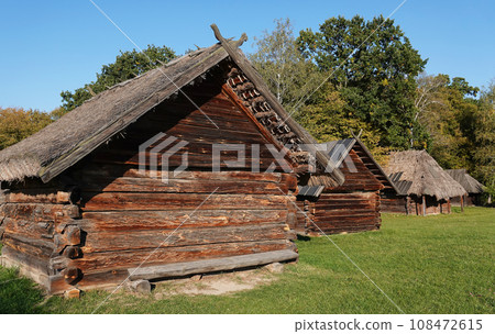 Kiev, Ukraine September 26, 2021: An old Ukrainian house in the National Museum of Folk Architecture and Life of Ukraine "Pirogovo" in Kiev 108472615