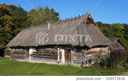 Kiev, Ukraine September 26, 2021: An old Ukrainian house in the National Museum of Folk Architecture and Life of Ukraine "Pirogovo" in Kiev 108472616
