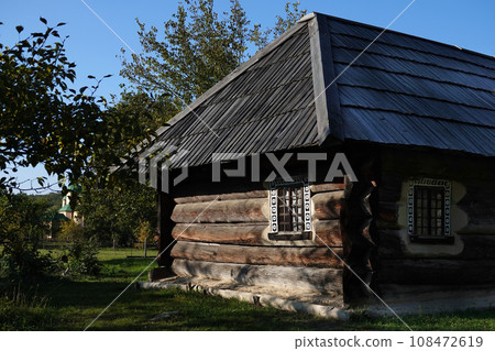 Kiev, Ukraine September 26, 2021: An old Ukrainian house in the National Museum of Folk Architecture and Life of Ukraine "Pirogovo" in Kiev 108472619