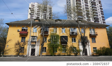 Kiev, Ukraine April 27, 2021: Old post-war building erected by captive Nazis in the city of Kiev Kiev, Ukraine April 27, 2021: Old post-war building erected by captive Nazis in the city of Kiev 108472837