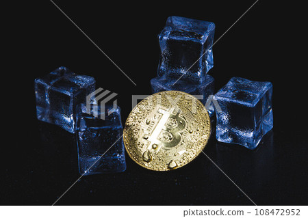 Ice and bitcoin coin. Freezing of cryptocurrency accounts. Frozen bitcoin coin. 108472952