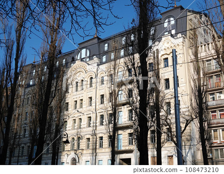 Kiev, Ukraine January 2, 2021: The ornate facade of an ancient building in the center of Kiev Kiev, Ukraine January 2, 2021: The ornate facade of an ancient building in the center of Kiev 108473210