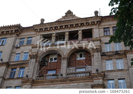 Kiev, Ukraine June 10, 2021: Facade of an old building on Khreshchatyk street in the city of Kiev Kiev, Ukraine June 10, 2021: Facade of an old building on Khreshchatyk street in the city of Kiev 108473261