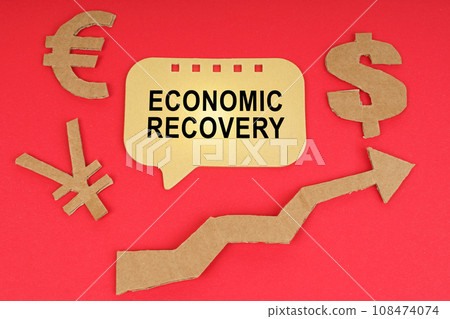 On the red surface there are money symbols, an arrow and a sign with the inscription - economic recovery 108474074