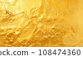 Texture of shiny yellow gold foil sheet. Gold background. Luxury shiny gold texture for design. Sample. Copy space. Metal background texture in gold. Gold paint. Template 108474360