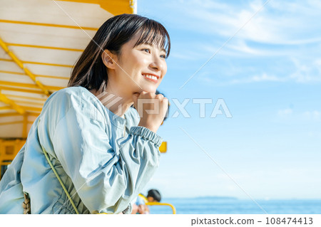 A woman on a boat A woman on a pleasure boat 108474413
