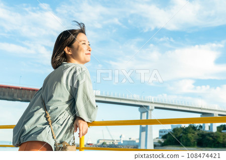 A woman on a boat A woman on a pleasure boat 108474421