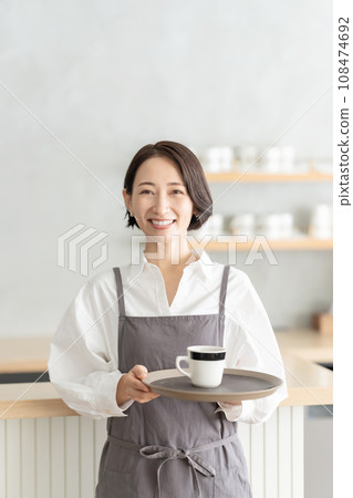 Women staff working at a cafe 108474692