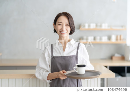 Women staff working at a cafe 108474696