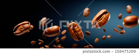 Coffee beans are shown in motion on black background, in the style of dynamic poses. 108475209