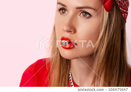 Beautiful woman with tiny cake on her mouth. Healthy unhealthy eating diet concept Beautiful woman with tiny cake on her mouth. Healthy unhealthy eating diet concept 108475647