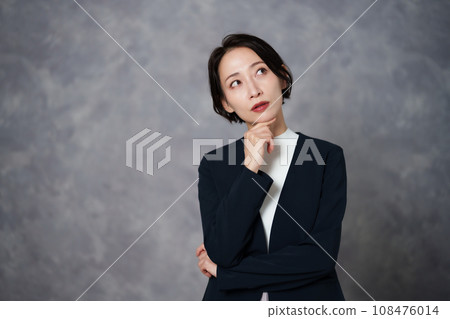Portrait of a woman wearing a jacket 108476014