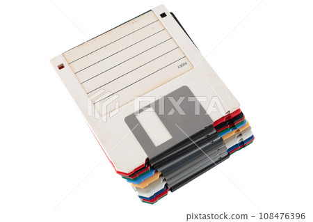 Colored old retro floppy diskettes in stack. 108476396