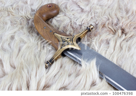 Ukraine Saber Sword on fur, 17th century. Poland, Lithuania, Hungary, Ukraine. Ukraine Saber Sword on fur, 17th century. Poland, Lithuania, Hungary, Ukraine. 108476398