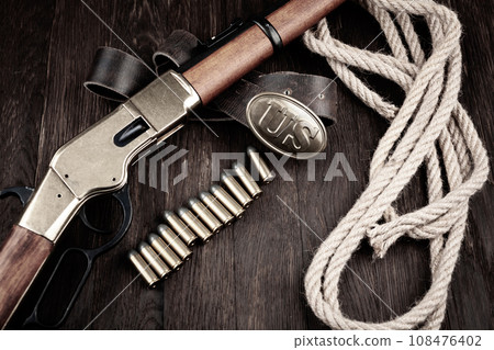 lever-action rifle with cartridges and US marked US Army bronze buckle 108476402