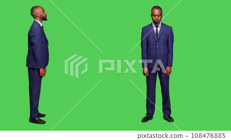 Disappointed office worker nodding head on camera, showing disapproval and rejection in studio. Frustrated entrepreneur being upset and expressing denial over full body greenscreen. Disappointed office worker nodding head on camera, showing disapproval and rejection in studio. Frustrated entrepreneur being upset and expressing denial over full body greenscreen. 108476885