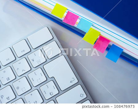 Documents and keyboard on the table Documents and keyboard on the table 108476973