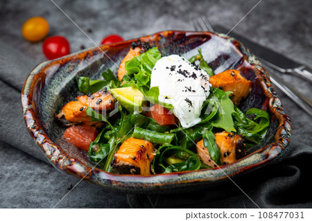 salad with spinach, eel, lime, sour cream, side view salad with spinach, eel, lime, sour cream, side view 108477031