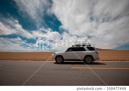 Car road trip in tibet, China 108477499