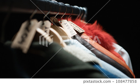 Discount tags on Clothes for black friday Discount tags on Clothes for black friday 108477858